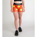 Front on-model view of women's smileys print Chicknlegs compression shorts
