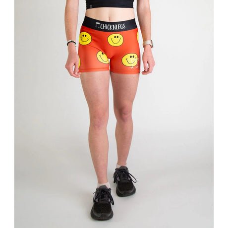 Front on-model view of women's smileys print Chicknlegs compression shorts