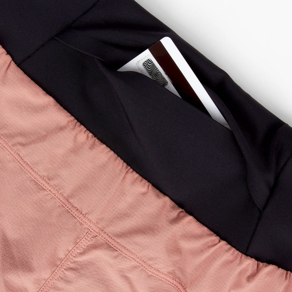 Pocket detail of the ciele women's TRNShort 4" brief 2 in rose dawn colour