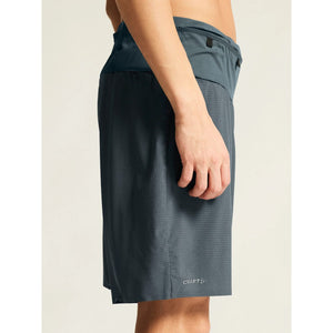 Craft Pro Trail Shorts Men's model side view in Norit colour