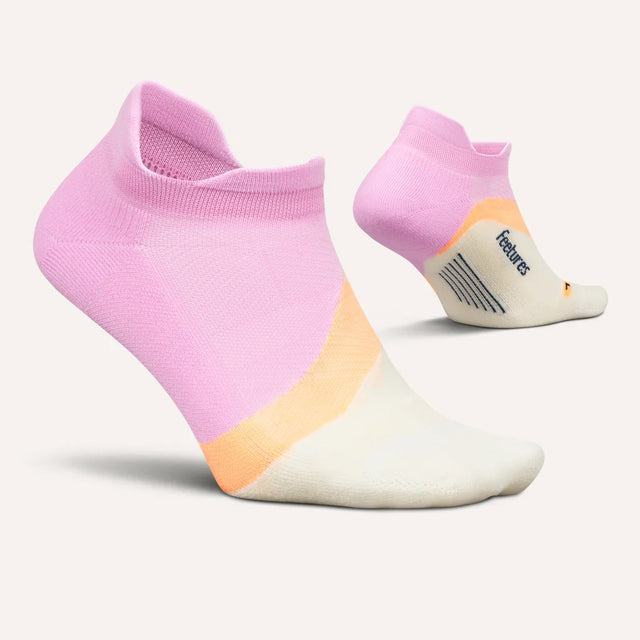 Side and bottom view of Feetures Elite LC no show tab sock in pink citrus colour