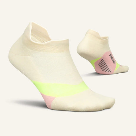 Side and bottom view of Feetures Elite LC no show tab socks in sandy melon colour