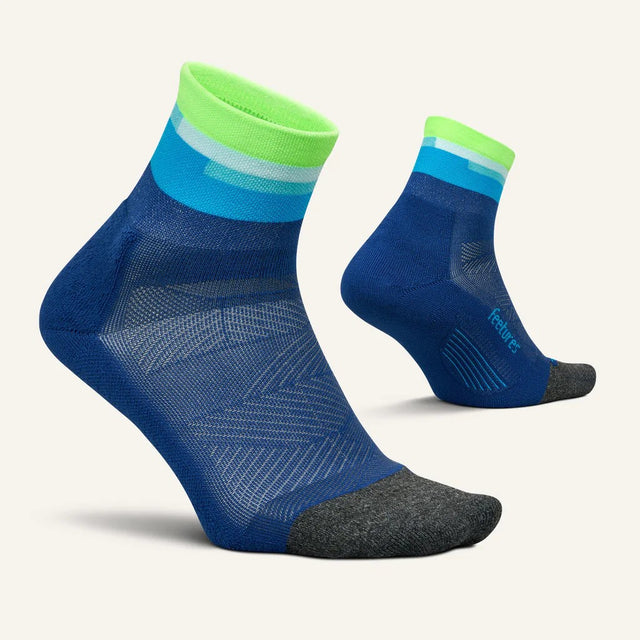Side and bottom view of Feetures Elite ULC quarter socks in surfboard blue colour