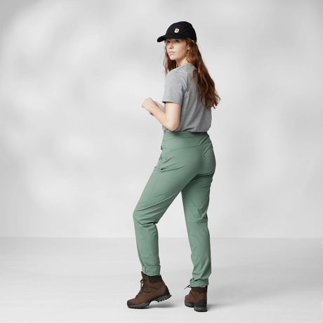 Back view of model in Fjallraven women's high coast trail trousers