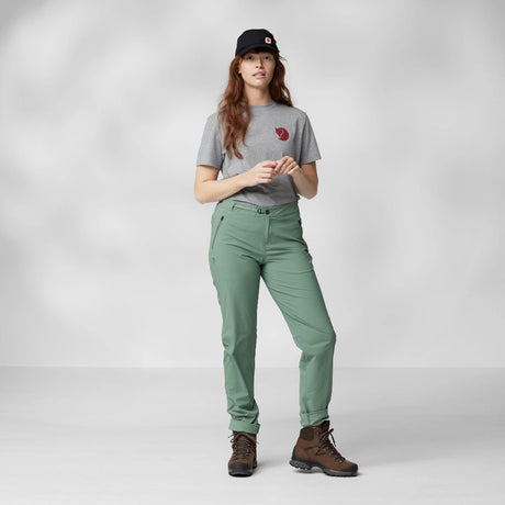 Front view of model in Fjallraven women's high coast trail trousers