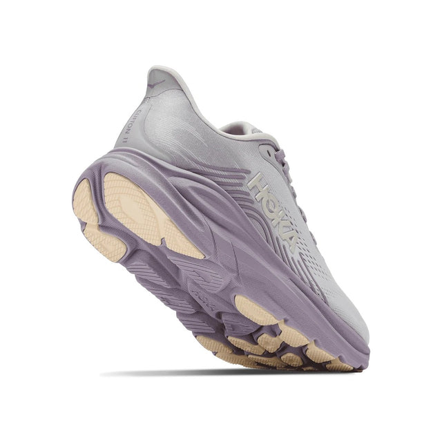 Sole view of women's Hoka Clifton 11 running shoe in stardust mellow/lilac colour