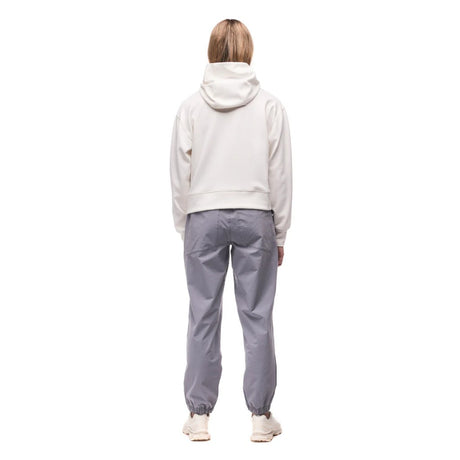 Back view on-model of Indyeva Andolana LT pants in dark boreal colour