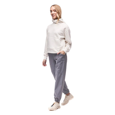 Front view on-model of Indyeva Andolana LT pants in dark boreal colour