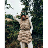 Lifestyle on-model view of Indyeva Selimut II Insulated Tunic Women's in silt colour