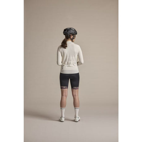 Back view of model wearing the Maloja SundaM cycle tights for wome in deep black colour