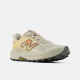 Side view of women's  white peach New Balance FuelCell Rebel Trail running shoe