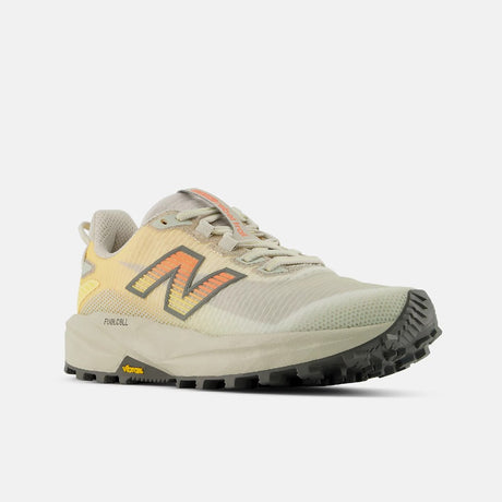 Side view of women's  white peach New Balance FuelCell Rebel Trail running shoe