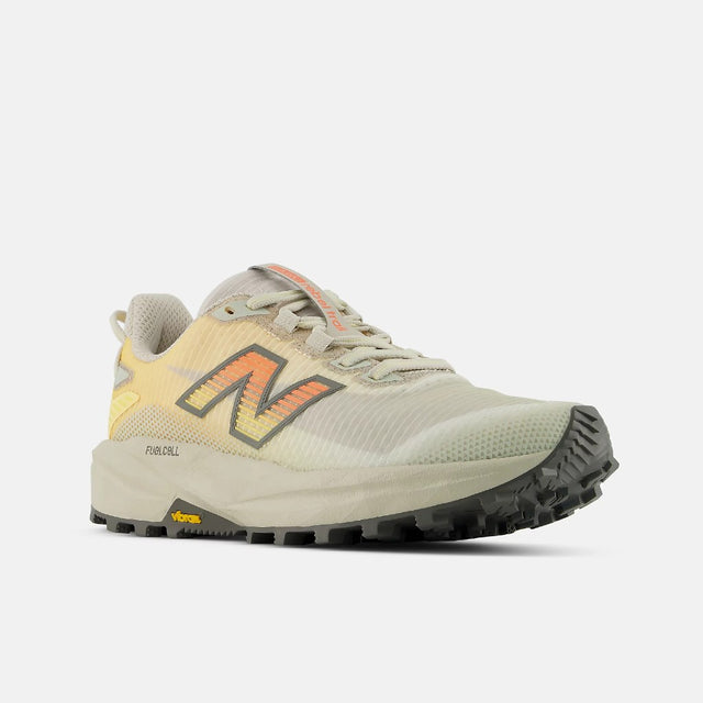 Side view of women's  white peach New Balance FuelCell Rebel Trail running shoe