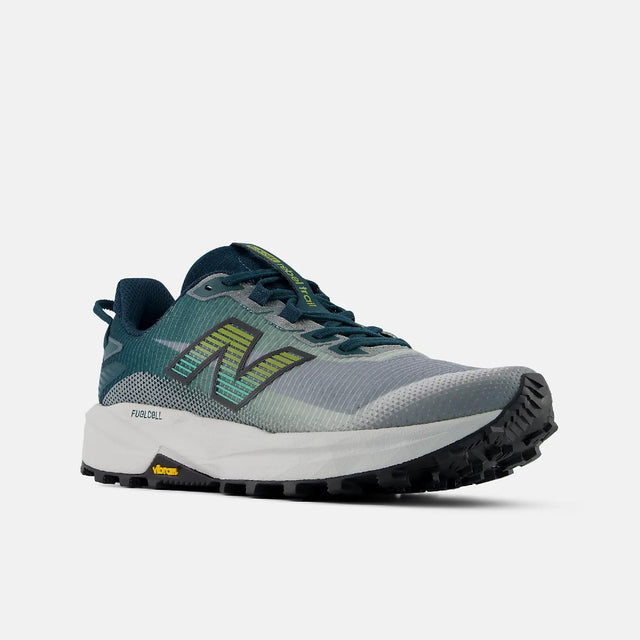 Side view of men's  medusa green/grey New Balance FuelCell Rebel Trail running shoe