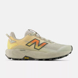 Side view of women's  white peach New Balance FuelCell Rebel Trail running shoe