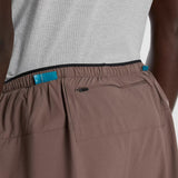 Back pocket detail view of New Balance RC Essential Shorts 5" Men's in Cortado with slate grey colour