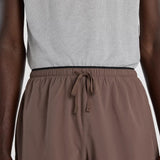 Front view detail of New Balance RC Essential Shorts 5" Men's in Cortado with slate grey colour