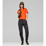 Front on-model view of Norrona Senja Flex1 Trackster pants for women in caviar black colour
