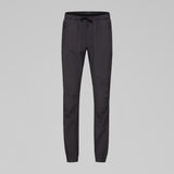 Front view of Norrona Senja Flex1 Trackster pants for women in caviar black colour