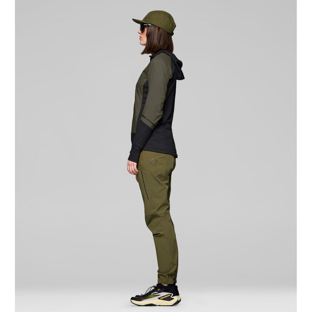 Side on-model view of Norrona Senja Warm1 Hood women's in olive night colour