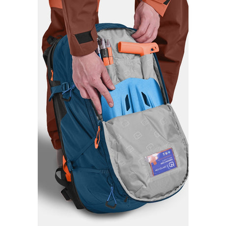 Black ortovox avabag zip-on stowaway bag compartment