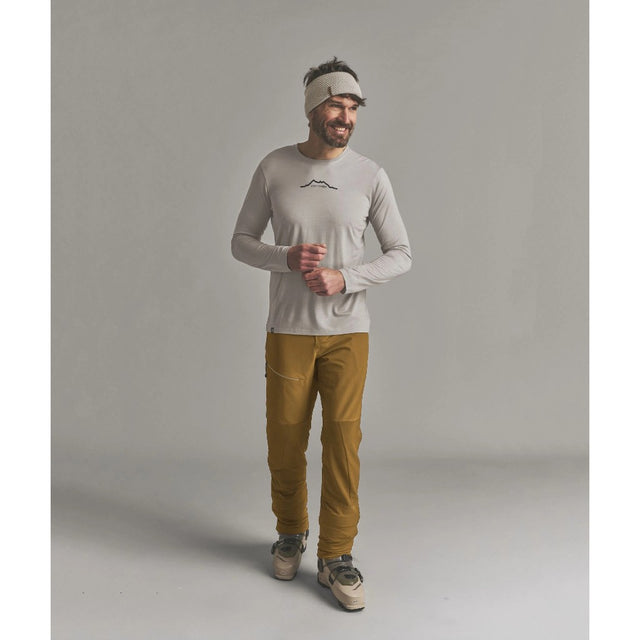Front on-model view of Ortovox Ortler Softshell pants men's in dark cumin colour