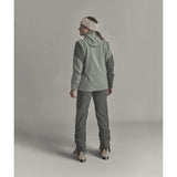 Back on-model view of Ortovox Ortler Softshell pants women's in dark sage colour