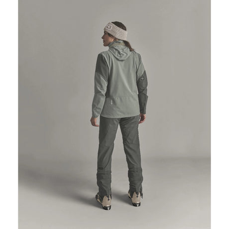 Back on-model view of Ortovox Ortler Softshell pants women's in dark sage colour