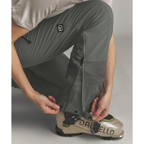 Boot detail view of Ortovox Ortler Softshell pants women's in dark sage colour