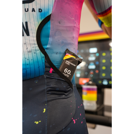 Precision Fuel 60g chew bar in a cycling bib pocket