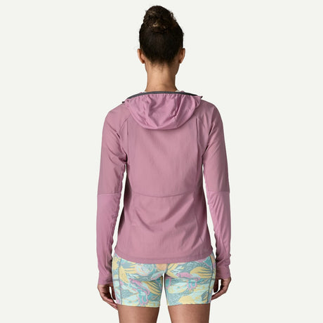 Back view on-model of Patagonia's  women's Airshed Pro Pullover in light violet colour