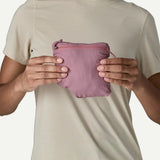 Packed view of Patagonia's  women's Airshed Pro Pullover in light violet colour