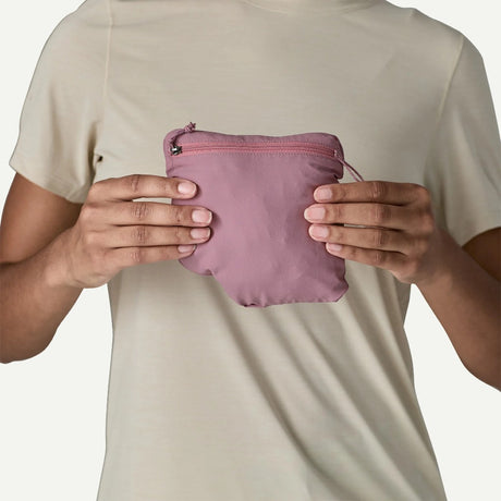 Packed view of Patagonia's  women's Airshed Pro Pullover in light violet colour