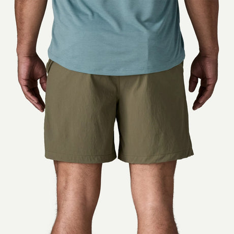 Back on-model view of Patagonia baggies lights 6" men's in basin green colour