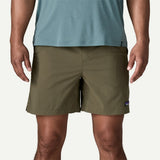 Front on-model view of Patagonia baggies lights 6" men's in basin green colour
