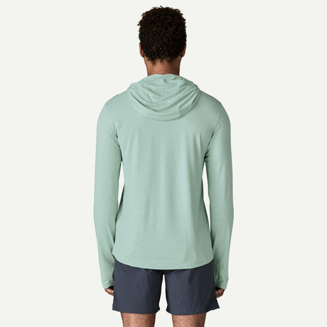 Back view of on-model men's Patagonia's cap cool sun hoody in Thermal Blue Tin Ice X-Dye