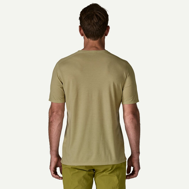 Back view on-model of Patagonia's men's Capilene cool trail shirt in weathered stone