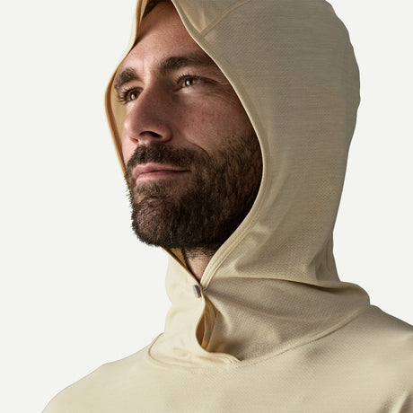 Hood detail on-model of Patagonia Capilene Cool Ultra Hoody women's in pumice dyno white x-dye colour