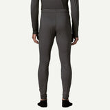 Back on-model view of Patagonia's Men Capilene Lightweight Bottoms in black colour