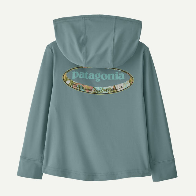 Back view of Patagonia Capiline W hoody in 95 oval logo shelly blue sage colour
