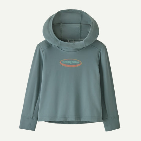 Front view of Patagonia Capiline W hoody in 95 oval logo shelly blue sage colour