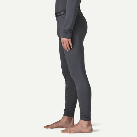 Side on-model view of Patagonia's Men Capilene Thermal weight Bottoms in Smolder blue colour