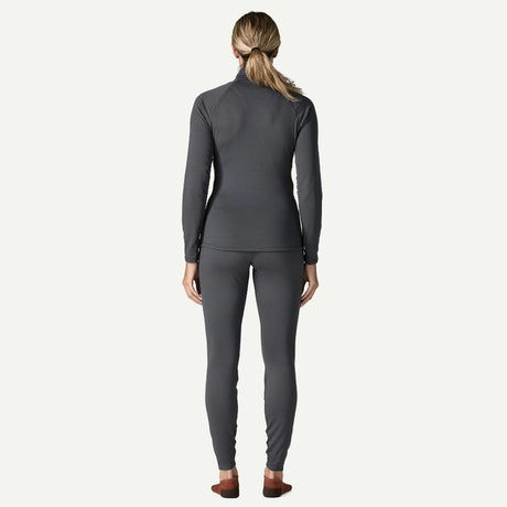Back on-model view of Patagonia's capilene thermal weight zip-neck women's in smolder blue colour