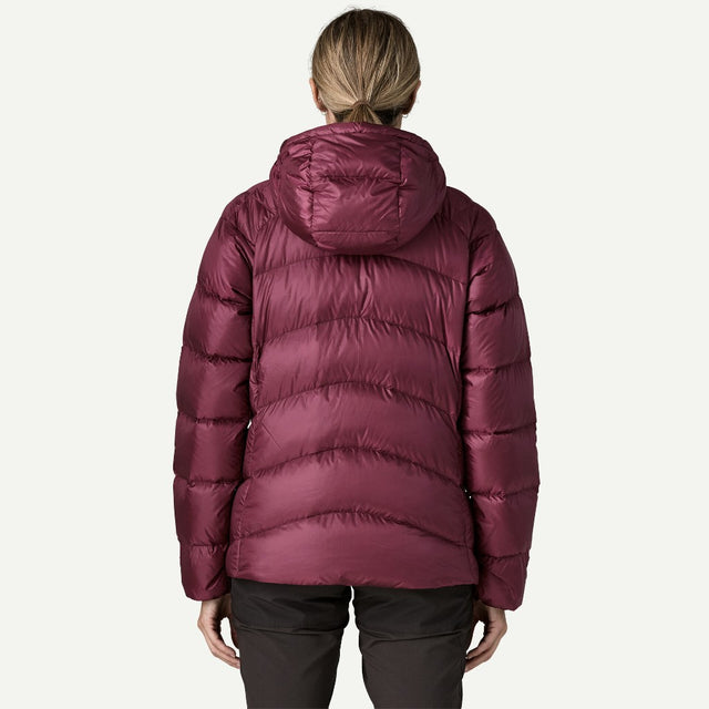 Back on-model view of Patagonia's Fitz Roy Down Hoody women's in Berry Fig colour
