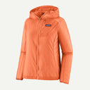 Front view of patagonia houdini jacket in peach sherbet colour