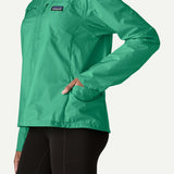 Pocket detail of Patagonia Houdini stash 1/2 zip pullover women's in aqua stone colour