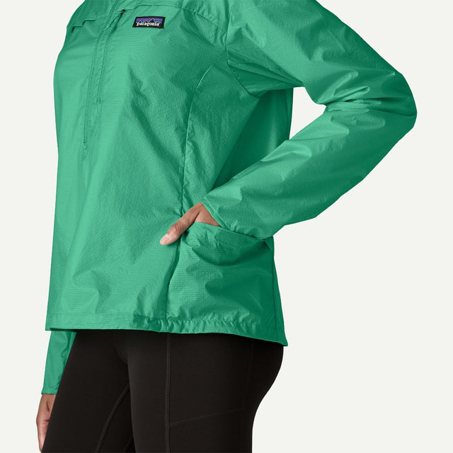 Pocket detail of Patagonia Houdini stash 1/2 zip pullover women's in aqua stone colour