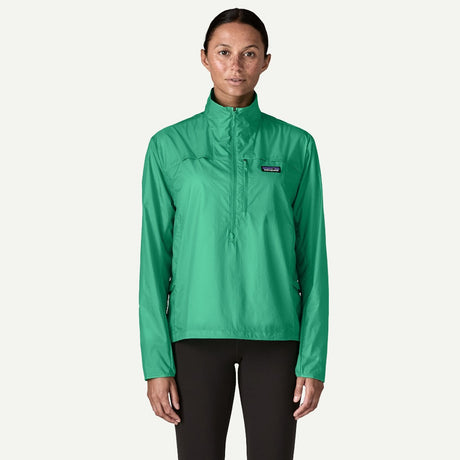 Front on-model view of Patagonia Houdini stash 1/2 zip pullover women's in aqua stone colour