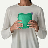 Packed view of Patagonia Houdini stash 1/2 zip pullover women's in aqua stone colour