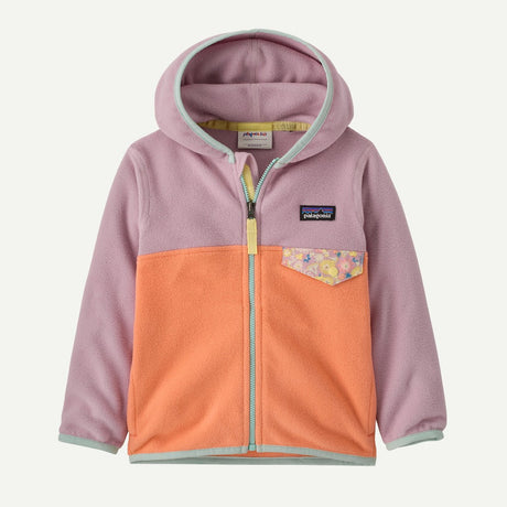 Front view of Patagonia kid's micro D snap-T jacket in peach sherbet with quiet violet